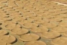 非洲晒土味饼的制作办法 网友感叹不用担心没钱真的吃土-捕鱼中文站